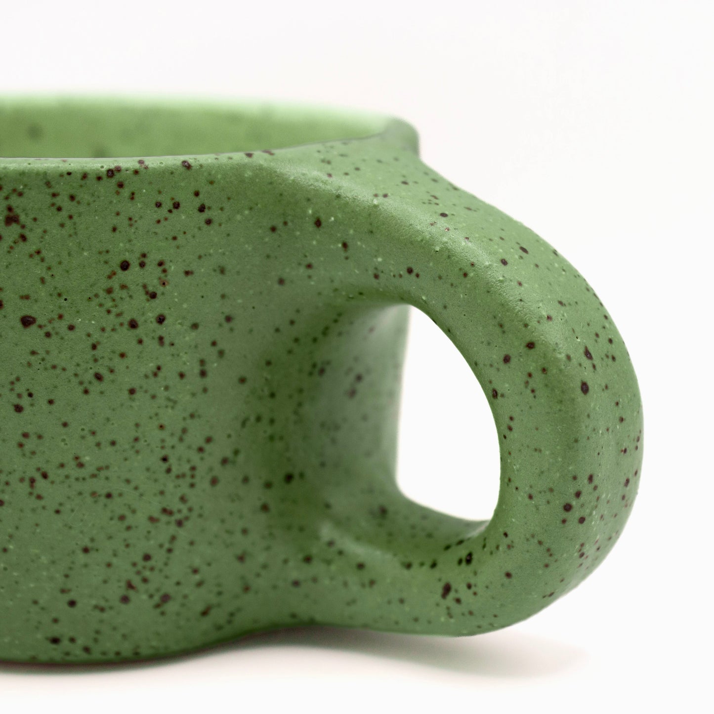 A Green Speckled Camping Mug